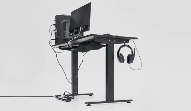 This is a SecretLab Gaming ajustable gaming desk or home office desk with a computer on top of it